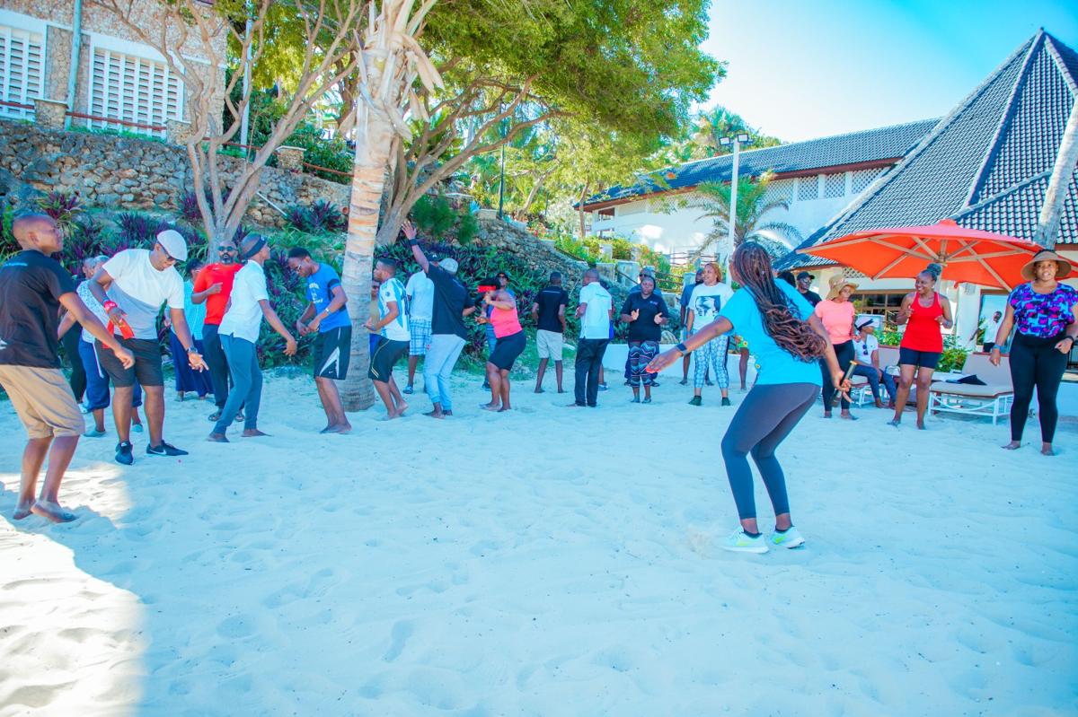 Team dance activity at the coast